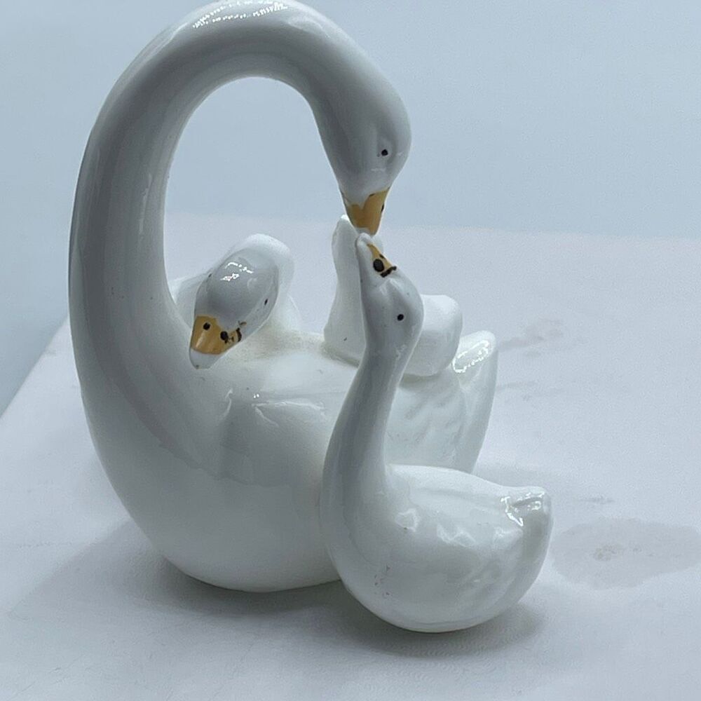 Vintage Royal Ascot swan family porcelain figurines.
